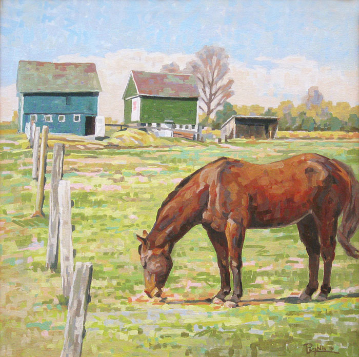 Grazing horse in front of barns